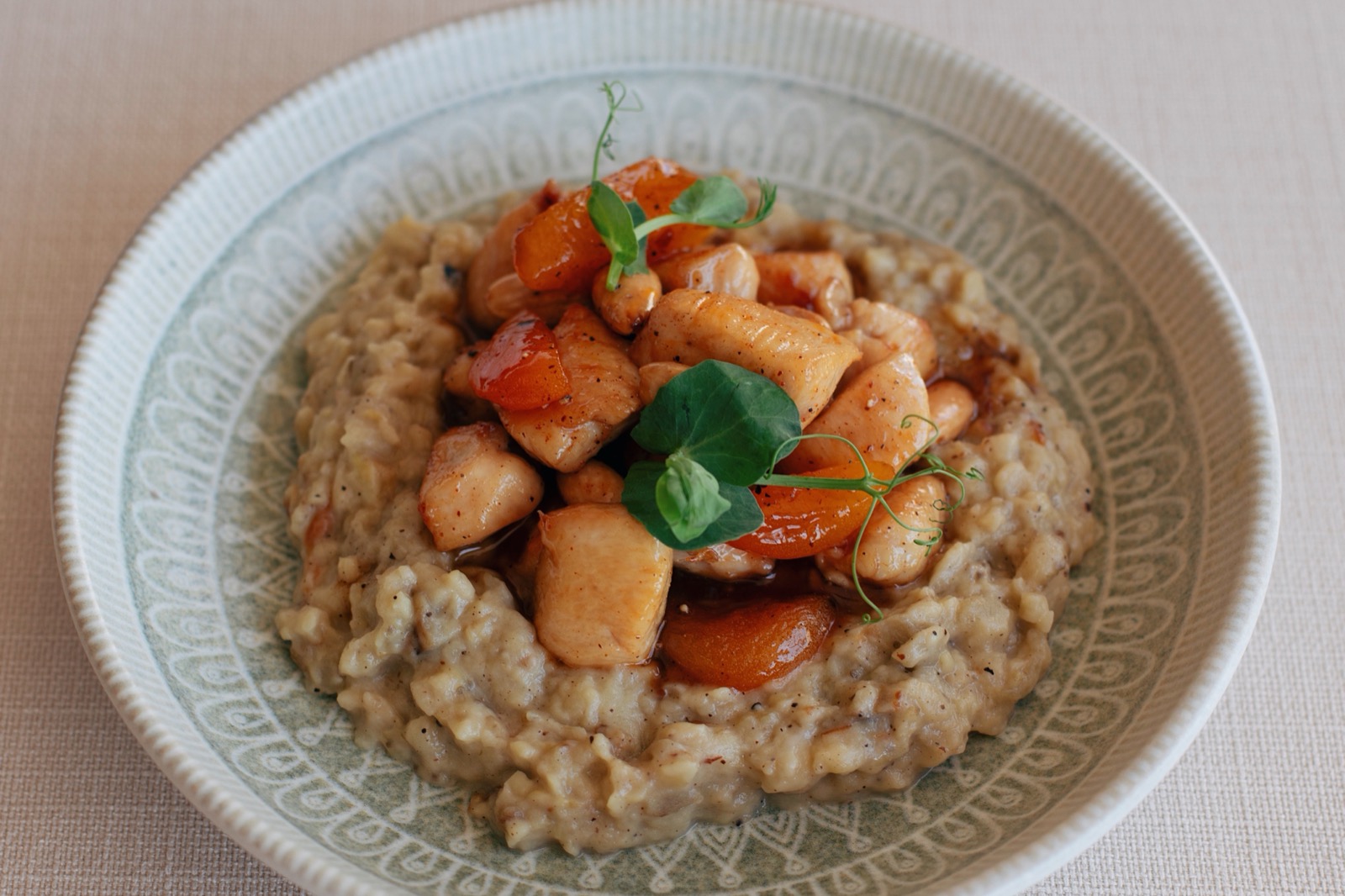 Shyra Restaurant - chicken sauteed with apricot and roasted almonds served on smoked eggplant puree