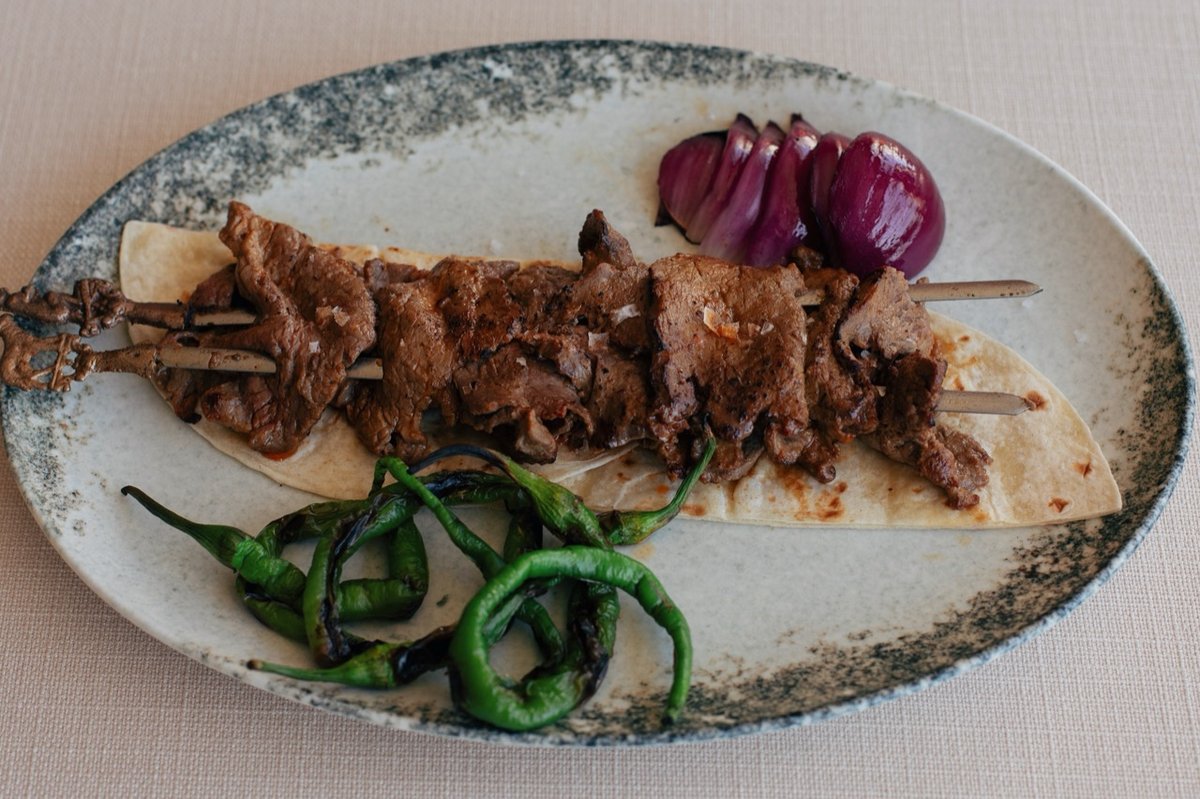 Shyra Restaurant - Shashlik kebab of beef tenderloin on skewers with grilled green peppers and red onion